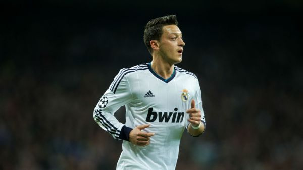 mesut-ozil-real-madrid-manchester-united-champions-league-13022013_b5ooj4y04wzf1inb64o0yvkth